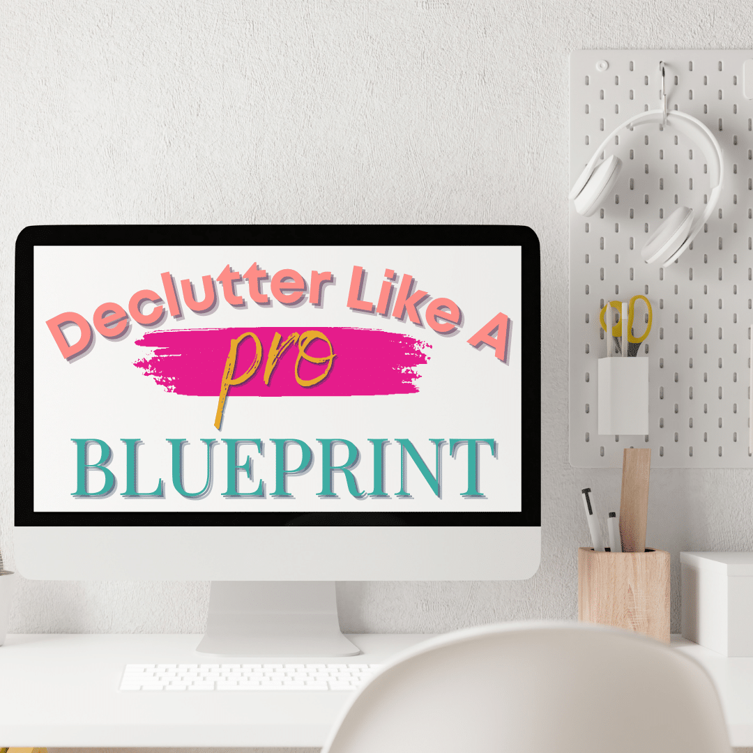 declutter like a pro blueprint text on desktop computer with pegboard and headphones hanging in background